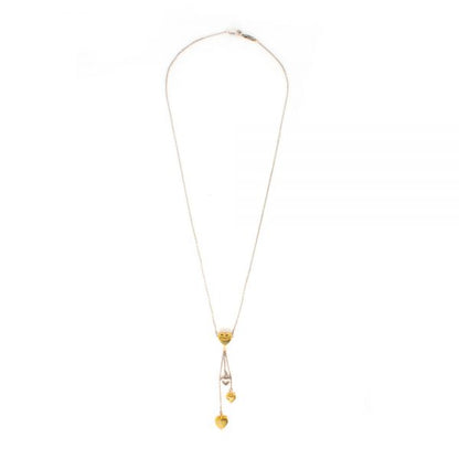 Tiffany and Co 18ct Yellow and White Gold Necklace with Heart Charm Pendants; Made in London, Circa 2000s, Comes in original Tiffany & Co travel pouch