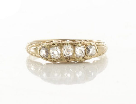 Antique Victorian Old Cut Diamond Five Stone Ring; set with five graduating old-cut diamonds, in 15ct yellow gold. Made in England, Circa 1860s