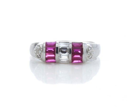 Contemporary Ruby and Diamond Dress Ring; central vertical strip of baguette-cut diamonds flanked by lines of baguette-cut rubies and cluster of round brilliant-cut diamonds to each tapered shoulder, 18ct white gold