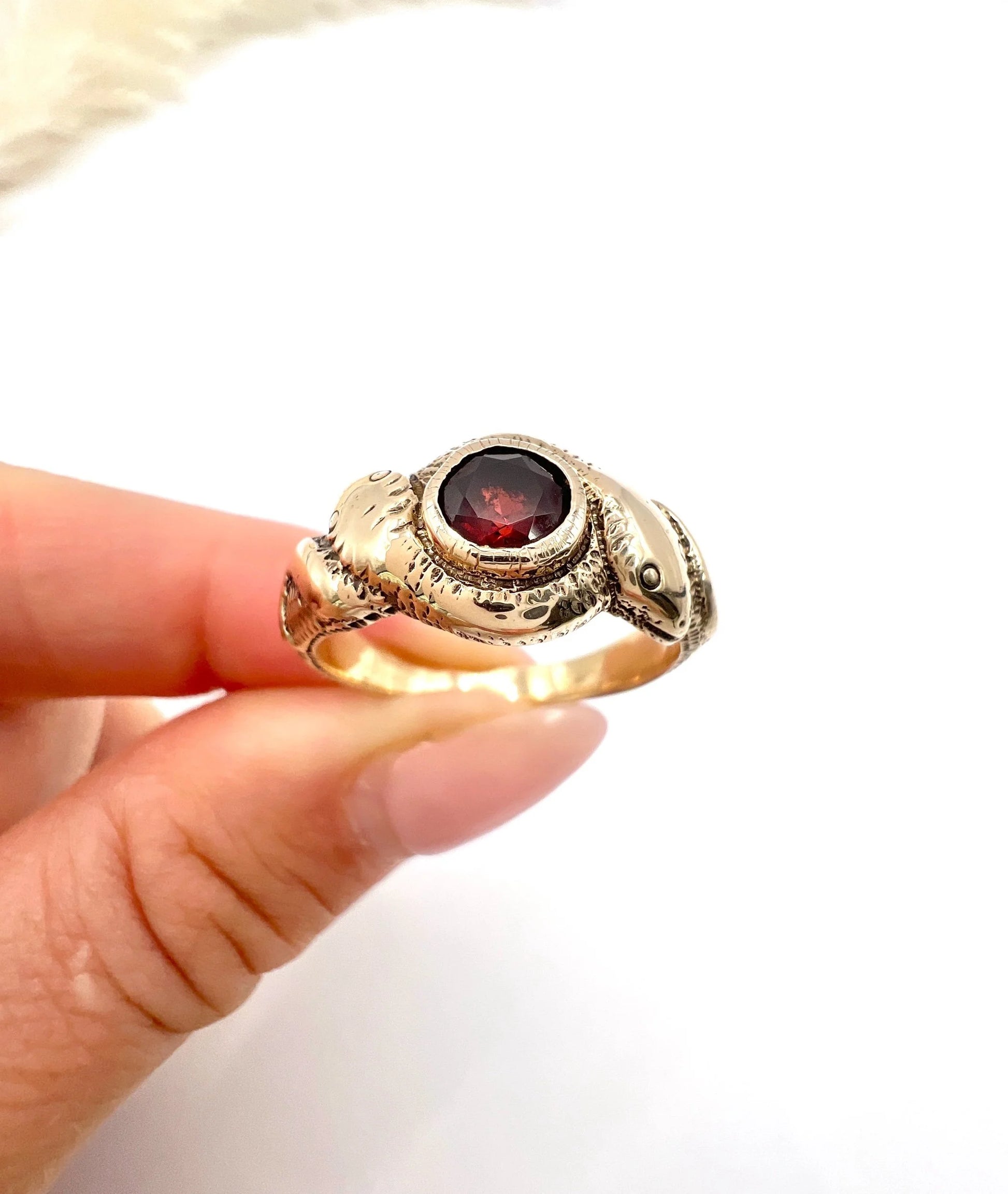 Edwardian 10 Carat Rose Gold Garnet Double-Headed Snake Ring, Circa 1910