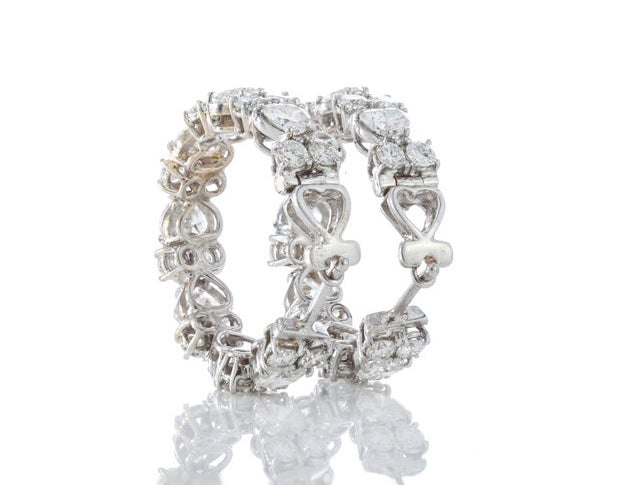 Heart Cut Diamond and 18ct White Gold Hoop Earrings; set with heart-cut and round brilliant-cut diamonds, 6.70 carat total. Circa 2000's