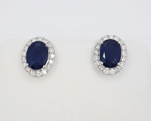 Sapphire and Diamond Oval Cluster Stud Earrings; 2.97cts oval faceted sapphires with brilliant cut diamond surround, 18ct white gold.