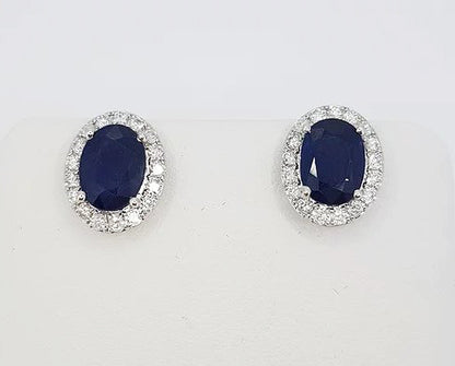 Sapphire and Diamond Oval Cluster Stud Earrings; 2.97cts oval faceted sapphires with brilliant cut diamond surround, 18ct white gold.