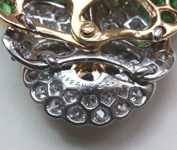 Vintage Tiffany and Co Diamond, Tsavorite Garnet and Sapphire Pansy Flower Brooch; set with 1.10ct tsavorite garnets and 2.10cts brilliant diamonds, Signed