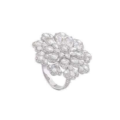Diamond Flower Cluster Cocktail Ring; set with 54 pear shaped rose cut diamonds surrounded by round brilliant cut diamonds, 4.38 carat total, diamonds have G/H colour and VS clarity