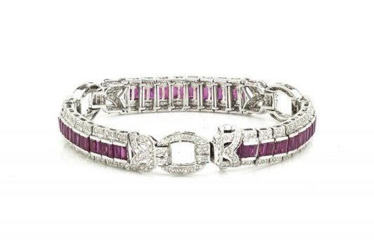 Vintage Ruby and Diamond Bracelet, 2.40cts baguette-cut rubies surrounded by 2.71cts diamonds, diamond set circular links, Circa 1990's.