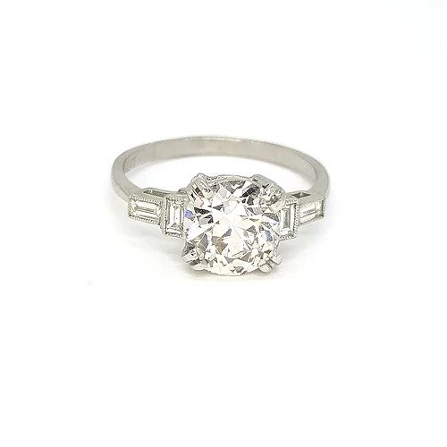 2.16ct Diamond Solitaire Engagement ring, baguette-cut diamond set shoulders, mounted in platinum
