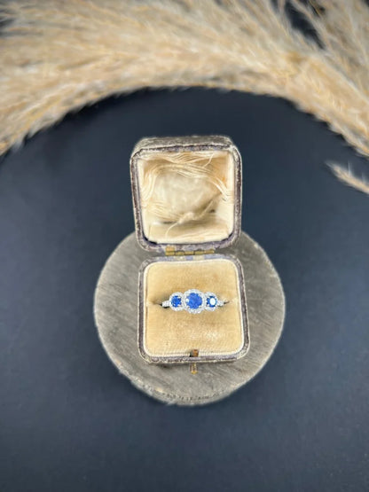 Sapphire And Diamond Cluster Trilogy Ring In Platinum