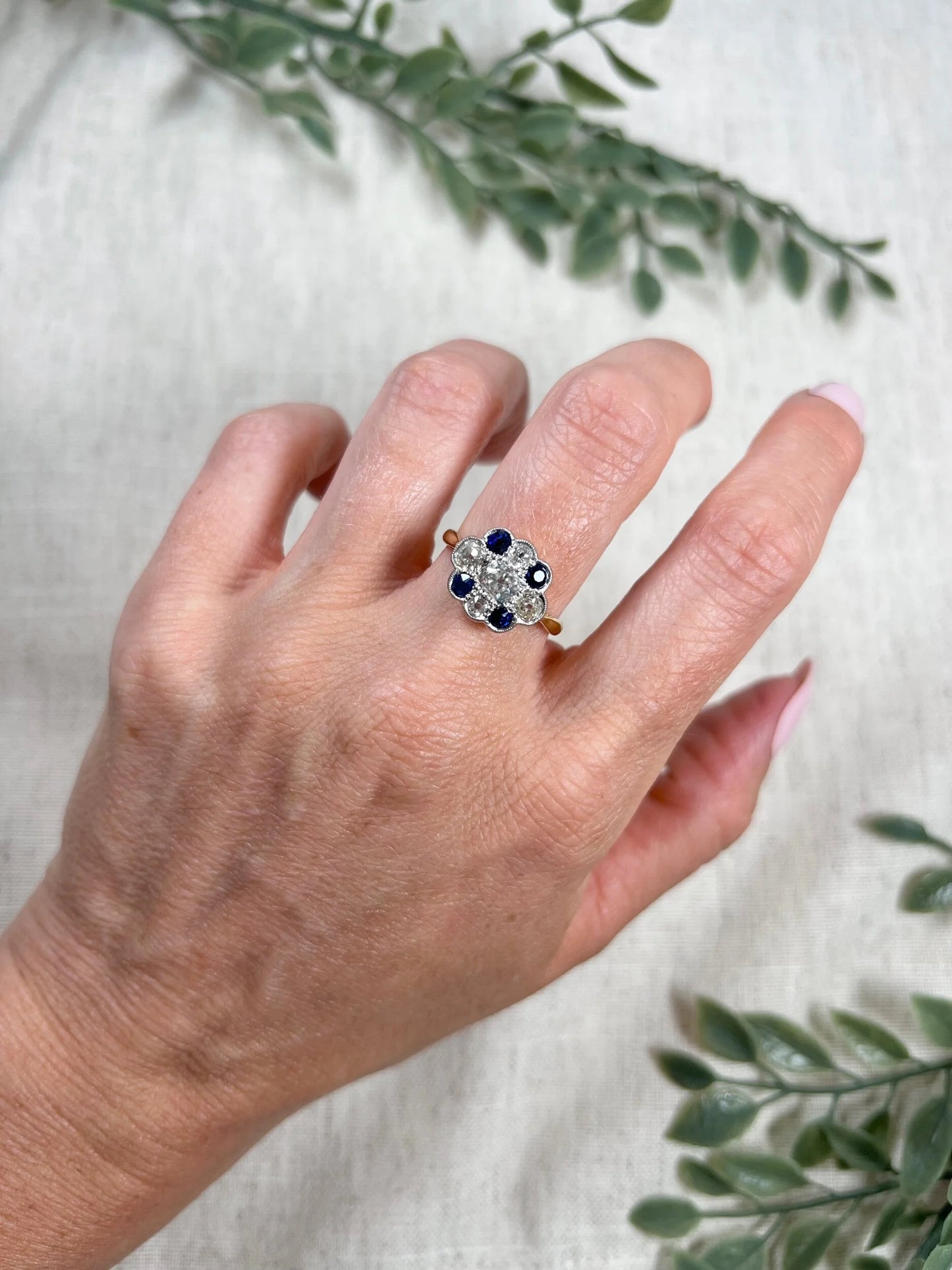 Edwardian 18 Carat Gold, Platinum, Sapphire and Diamond Daisy Cluster Ring, Circa 1910