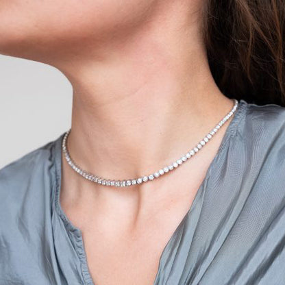 9ct Diamond Line Tennis Necklace in Platinum, 9 carats of round brilliant-cut diamonds set in individual bezel settings which gradually increase in size to the middle
