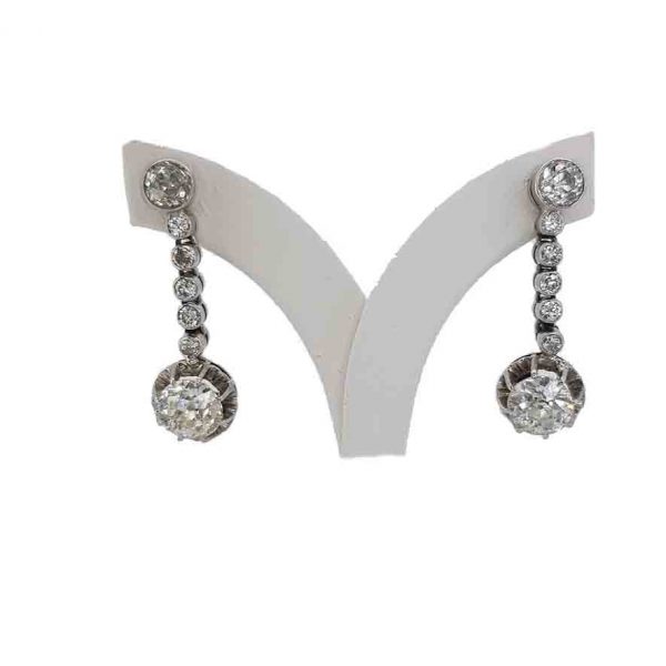 A pair of vintage old cut diamond drop earrings