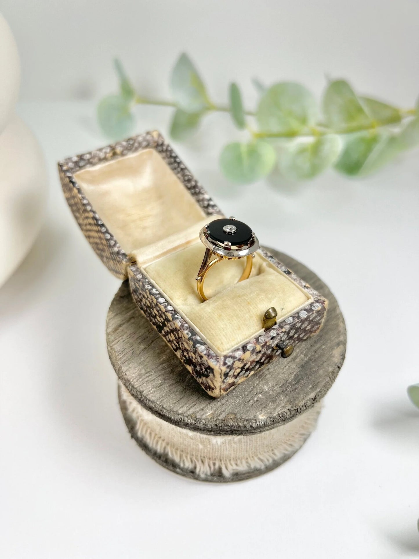 Art Deco 18 Carat Two Colour Gold Oval Onyx and Diamond Halo Ring, Circa 1920