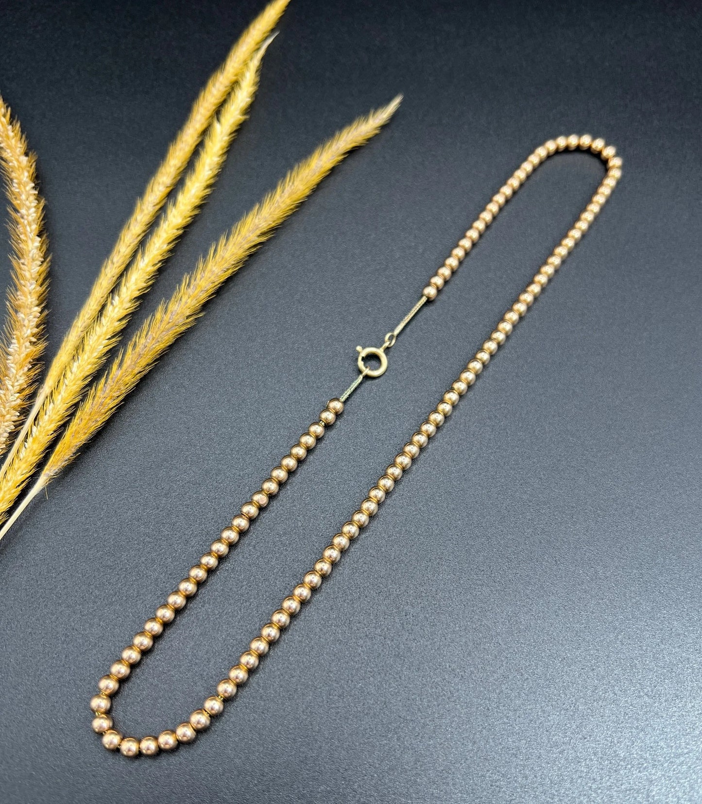 Edwardian 9 Carat Rose Gold Marseille Gold Ball Necklace, Circa 1910
