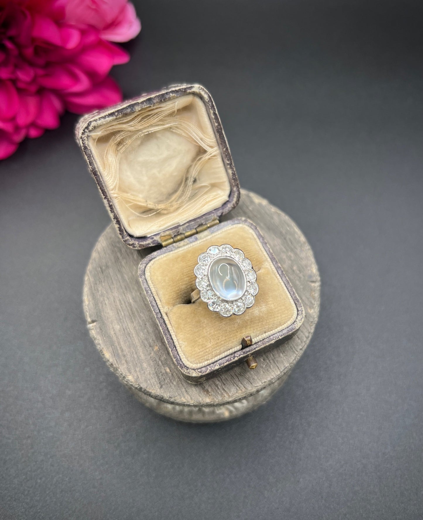 Antique French Platinum Cabochon Moonstone and Diamond Cluster Ring, Circa 1920