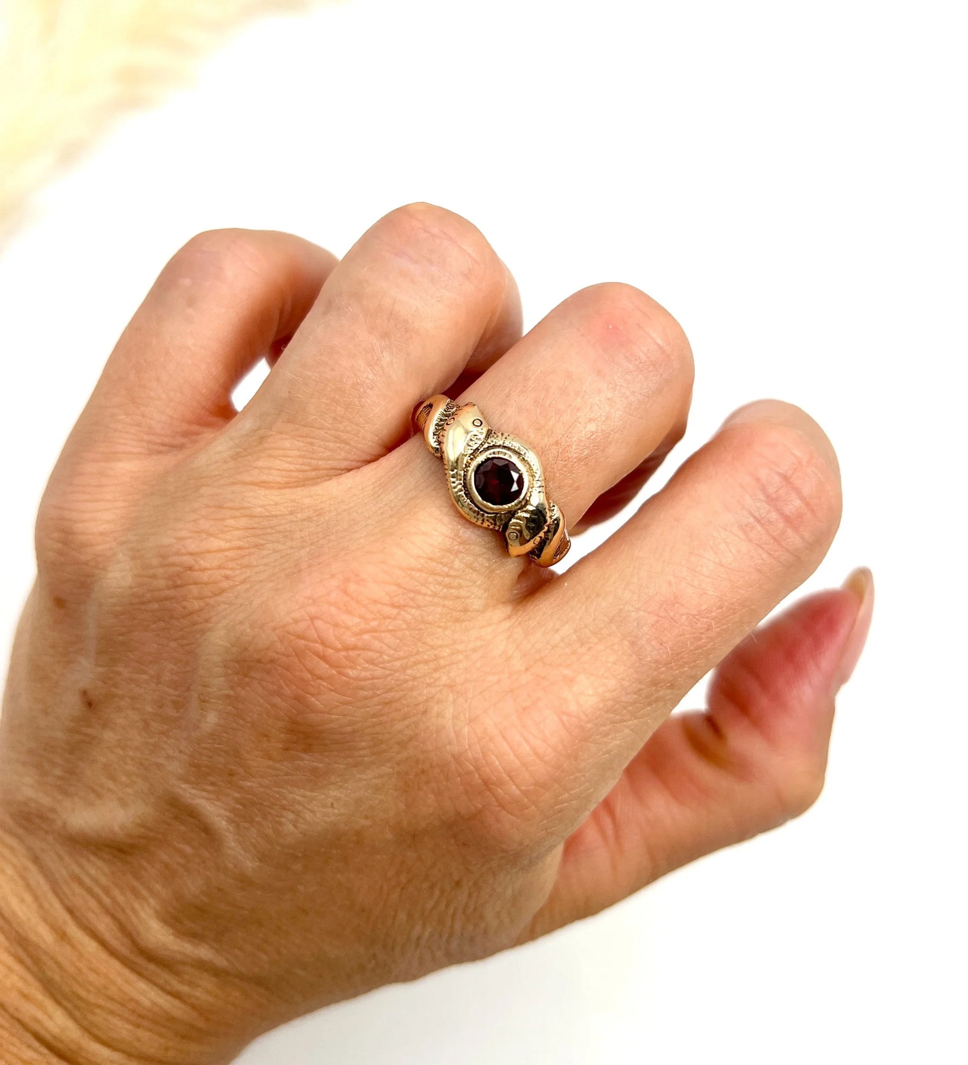 Edwardian 10 Carat Rose Gold Garnet Double-Headed Snake Ring, Circa 1910