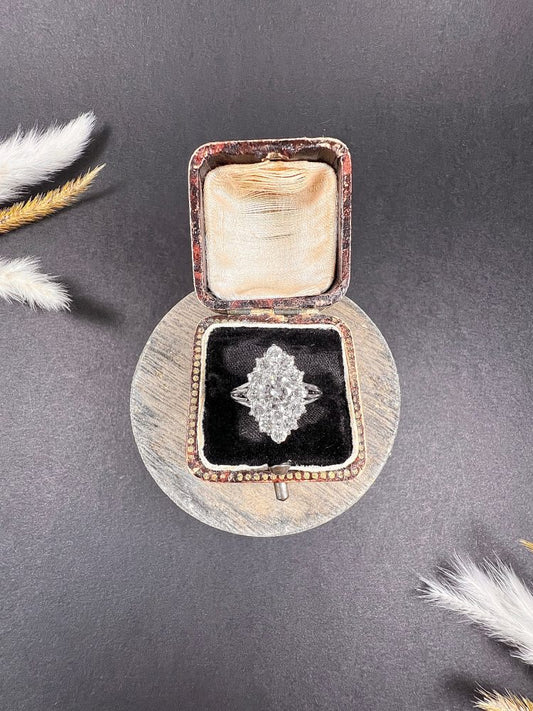 Vintage French 2ct Diamond Marquise Navette Cluster Ring, marquise navette-shaped body set with 2 carats of brilliant cut diamonds in 18ct white gold, with fancy split-shoulders and reeded band. Circa 1980s