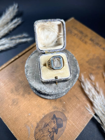 A yellow gold blue glass intaglio signet ring, in a ring box