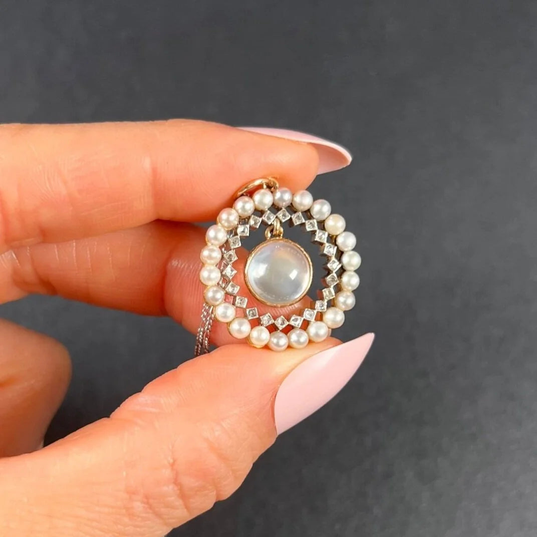 Antique 18 Carat Gold, Platinum, Moonstone, Diamond and Pearl Halo Pendant