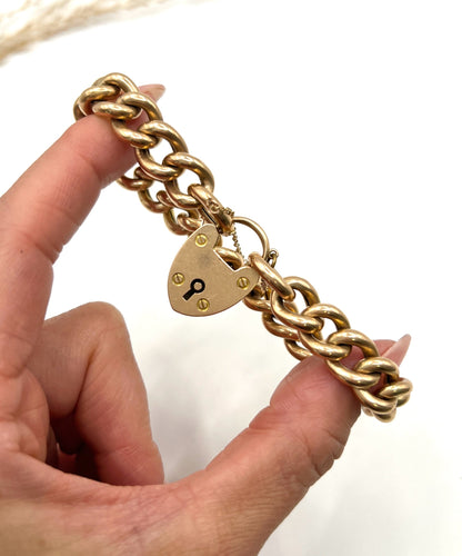 Victorian 15 Carat Rose Gold Curb Link Bracelet with Heart Padlock Clasp, Circa 1880