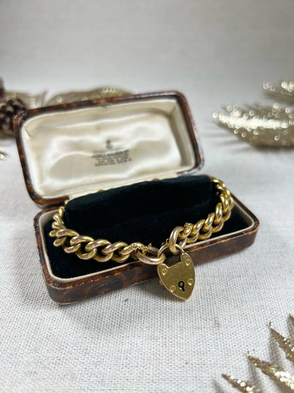Victorian 15 Carat Yellow Gold Curb Link Bracelet with Heart Padlock Clasp, Circa 1880