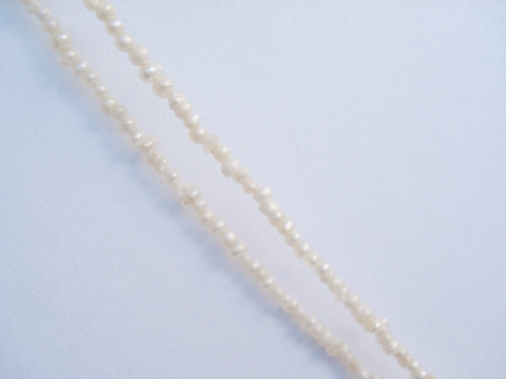 Antique Art Deco Diamond and Pearl Bow Pendant