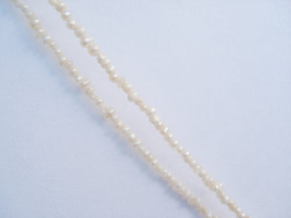 Antique Art Deco Diamond and Pearl Bow Pendant