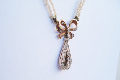 Antique Art Deco Diamond and Pearl Bow Pendant