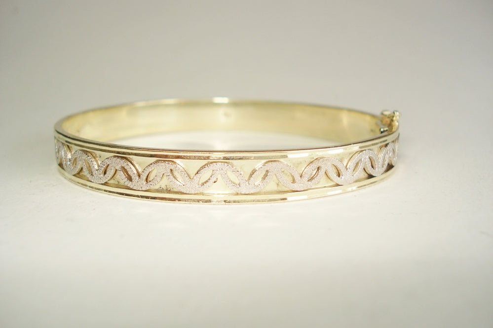 Gold Bracelet with White Gold Motif