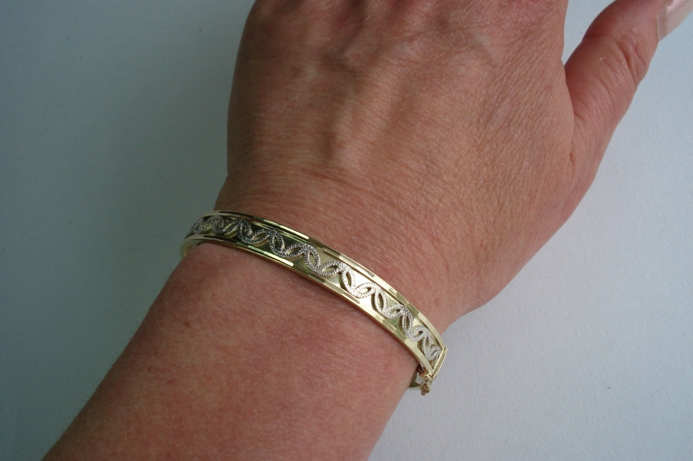 Gold Bracelet with White Gold Motif