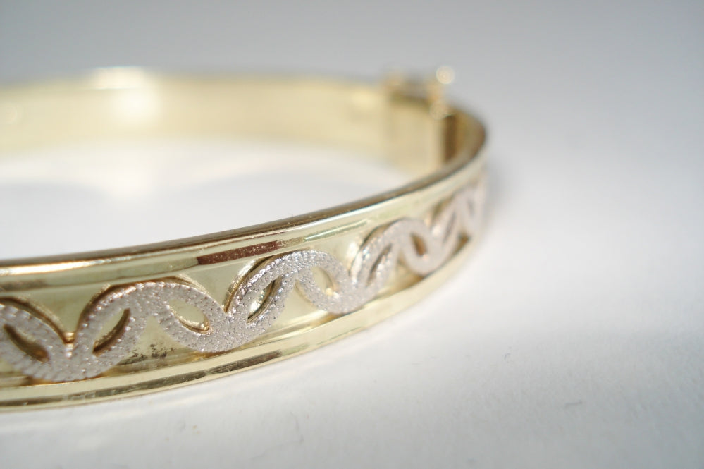 Gold Bracelet with White Gold Motif