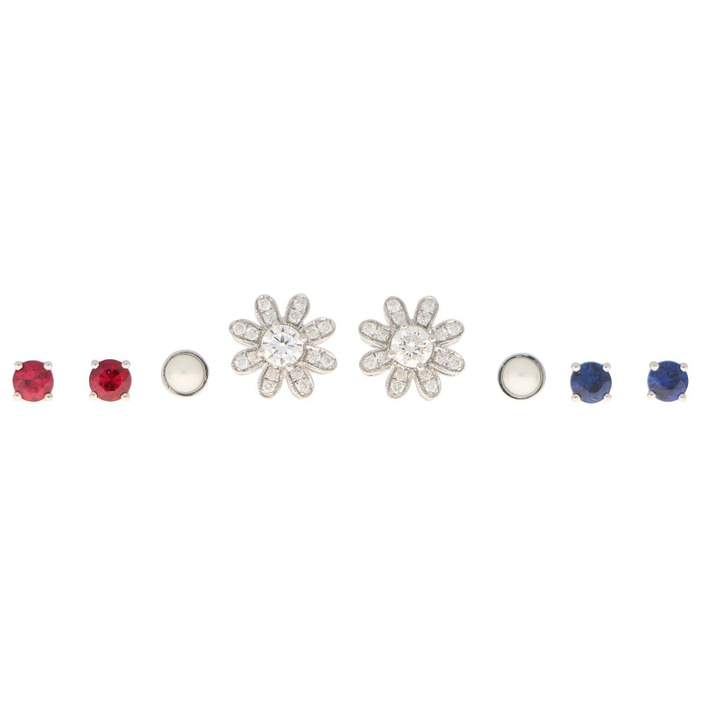 Interchangeable Ruby Sapphire Diamond Pearl Stud Earrings with Removeable Floral Surrounds; four individual pairs of stud earrings including ruby, sapphire, diamond and cultured pearl, with removeable floral jackets