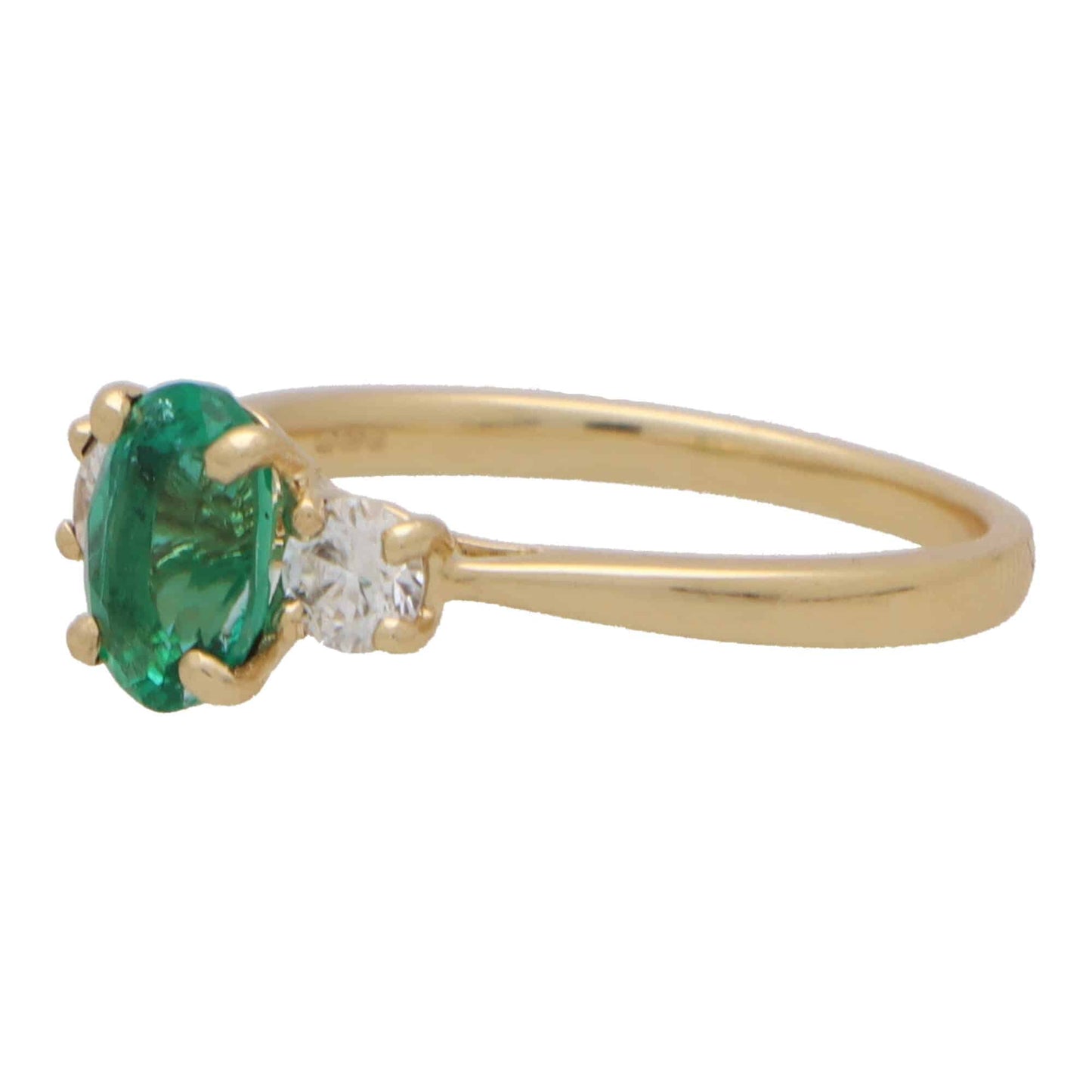 Oval Emerald and Diamond Three Stone Engagement Ring