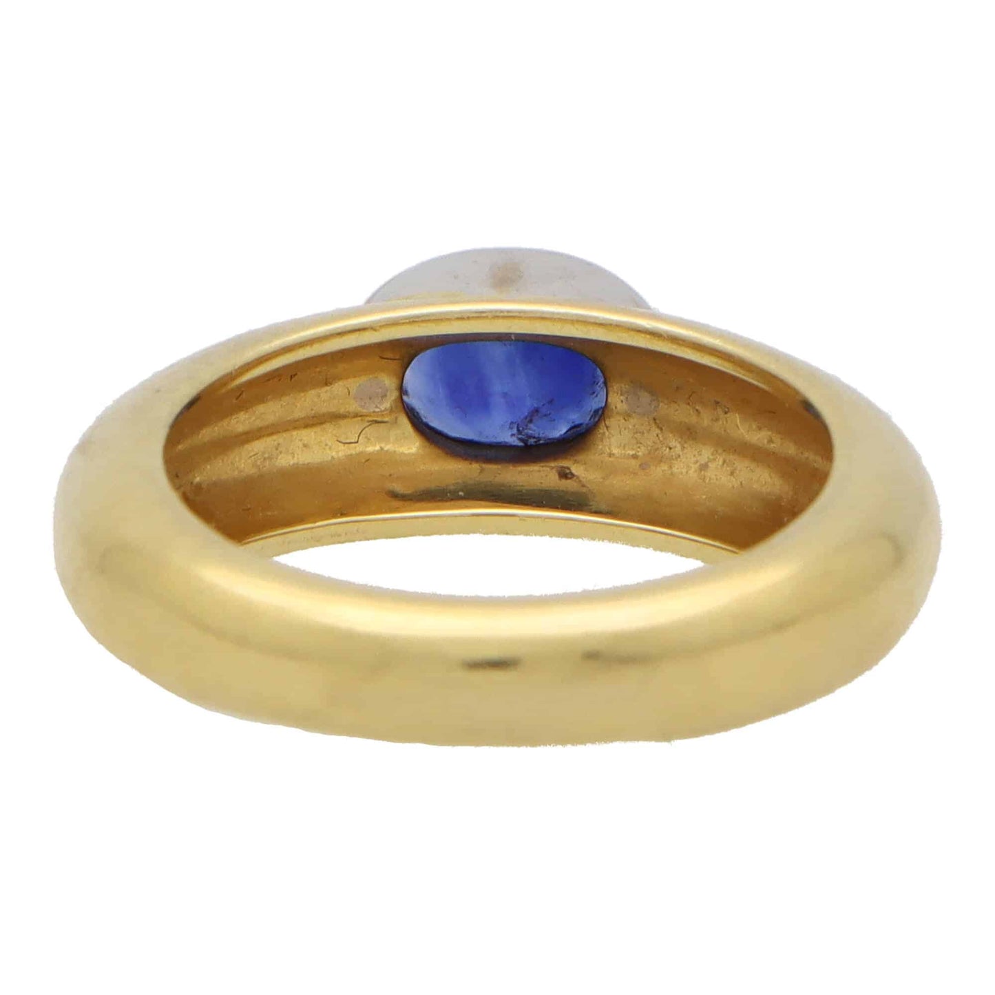 Garrard & Co. blue sapphire gypsy ring set in yellow and white gold.