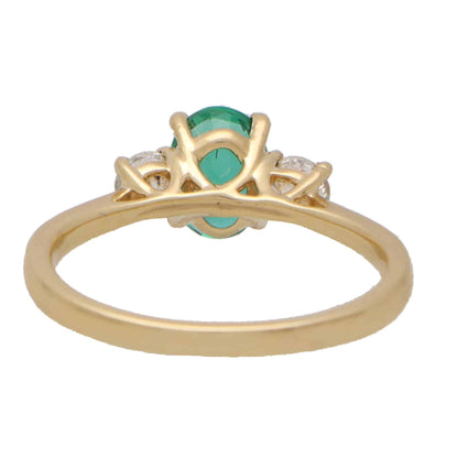 Oval Emerald and Diamond Three Stone Engagement Ring
