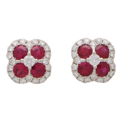 Ruby and diamond cluster earrings in white gold.