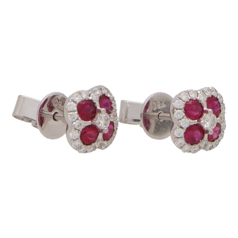 Ruby and diamond cluster earrings in white gold.