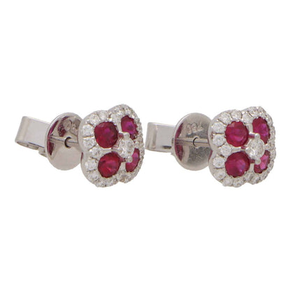Ruby and diamond cluster earrings in white gold.