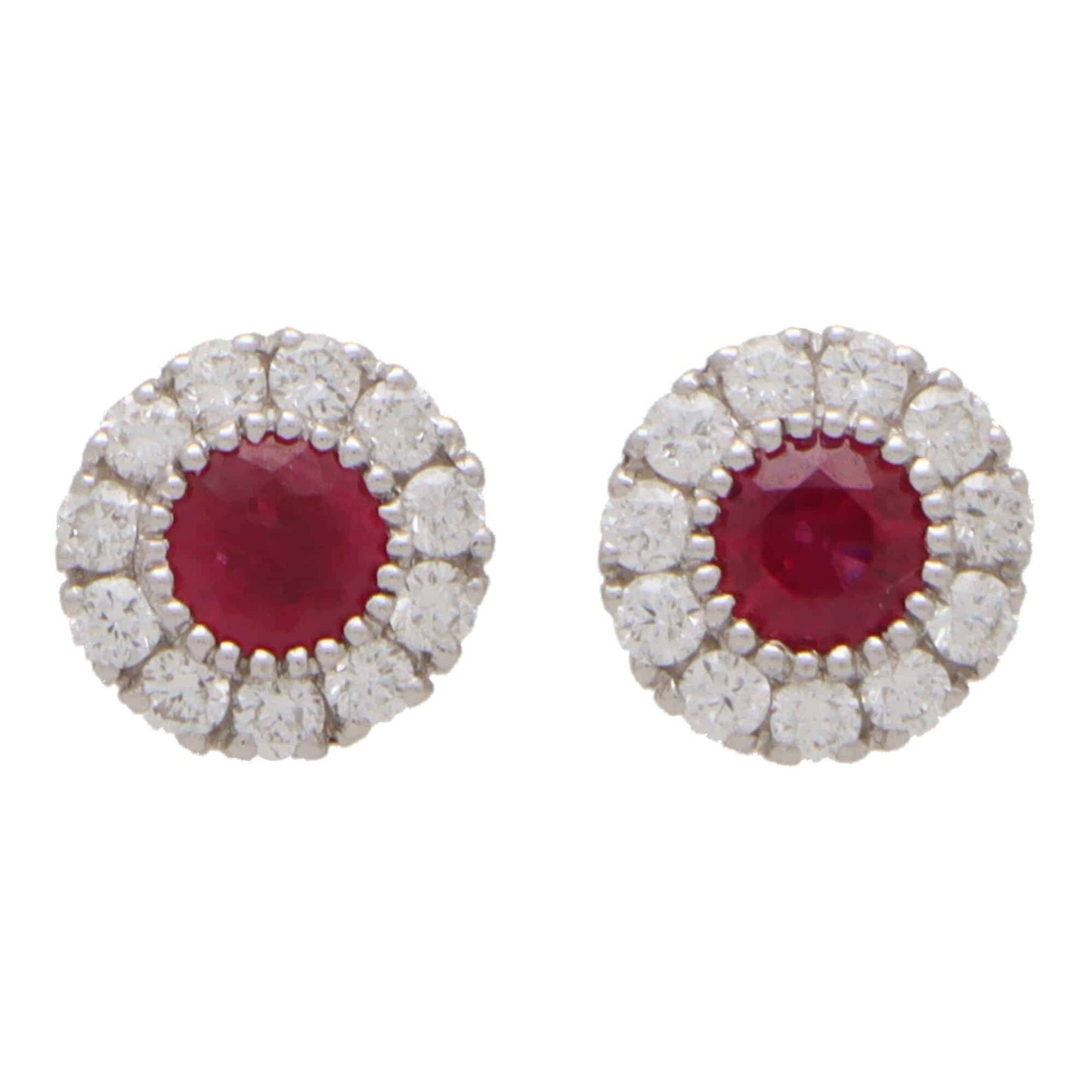 Ruby and diamond cluster earrings in white gold.