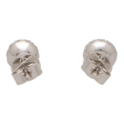 Ruby and diamond cluster earrings in white gold.