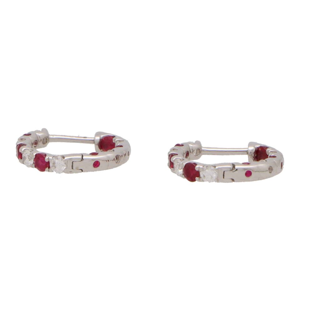 Ruby and diamond hoop earrings in white gold.