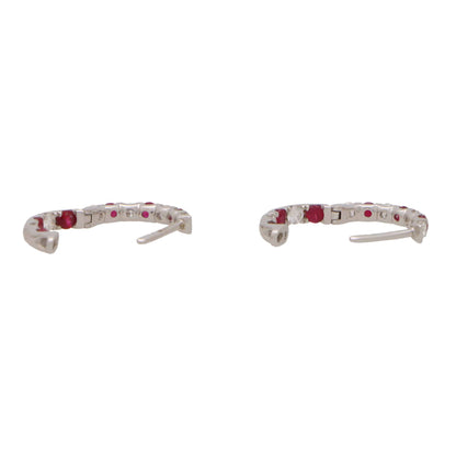 Ruby and diamond hoop earrings in white gold.
