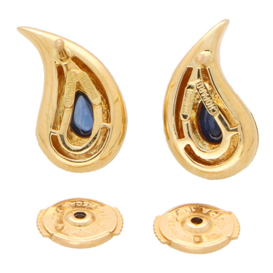 Sapphire stud earrings in yellow gold.