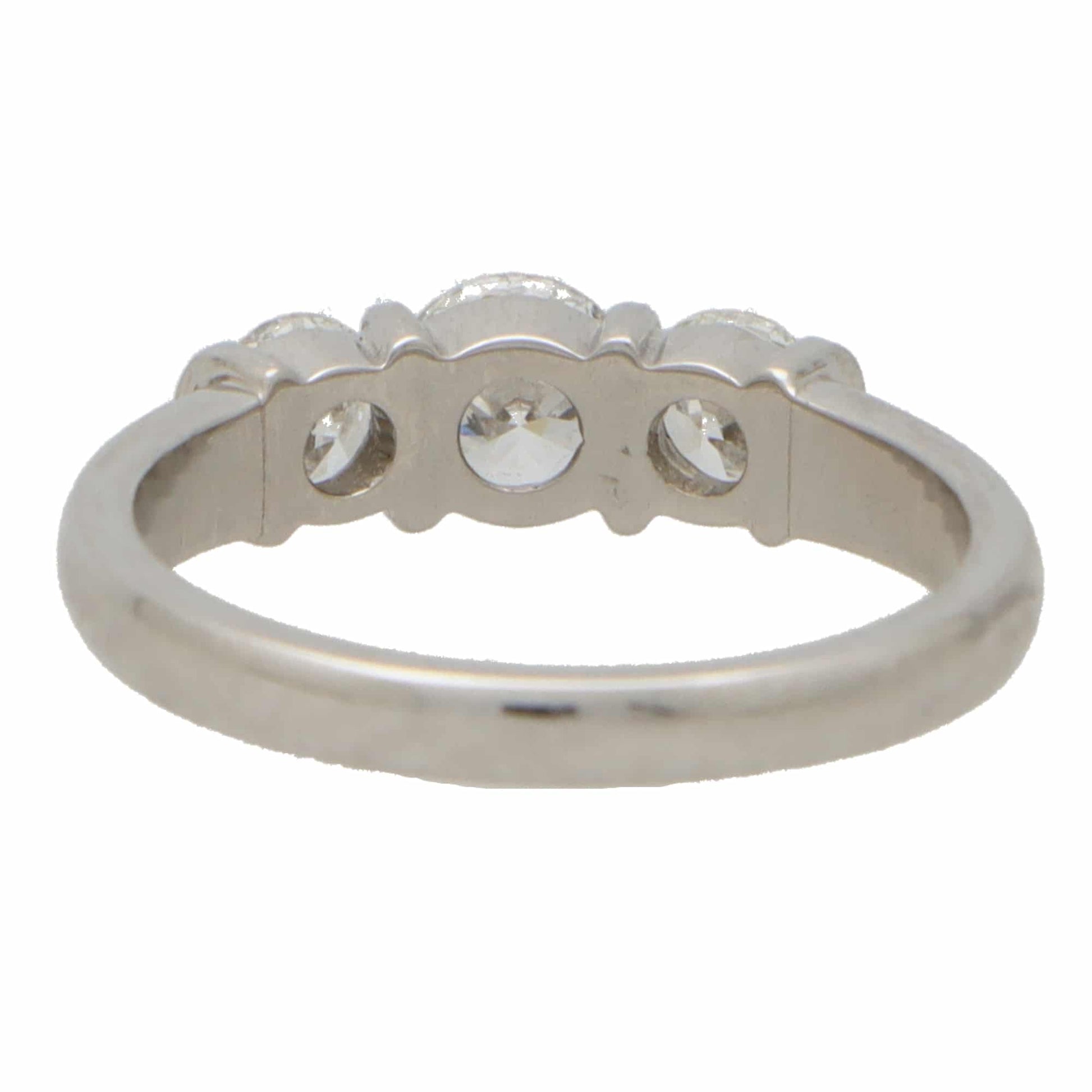0.75cts Bar Set Diamond Three Stone Ring in Platinum, central 0.45ct round brilliant-cut diamond flanked by two perfectly matched 0.15ct diamonds in bar settings in platinum