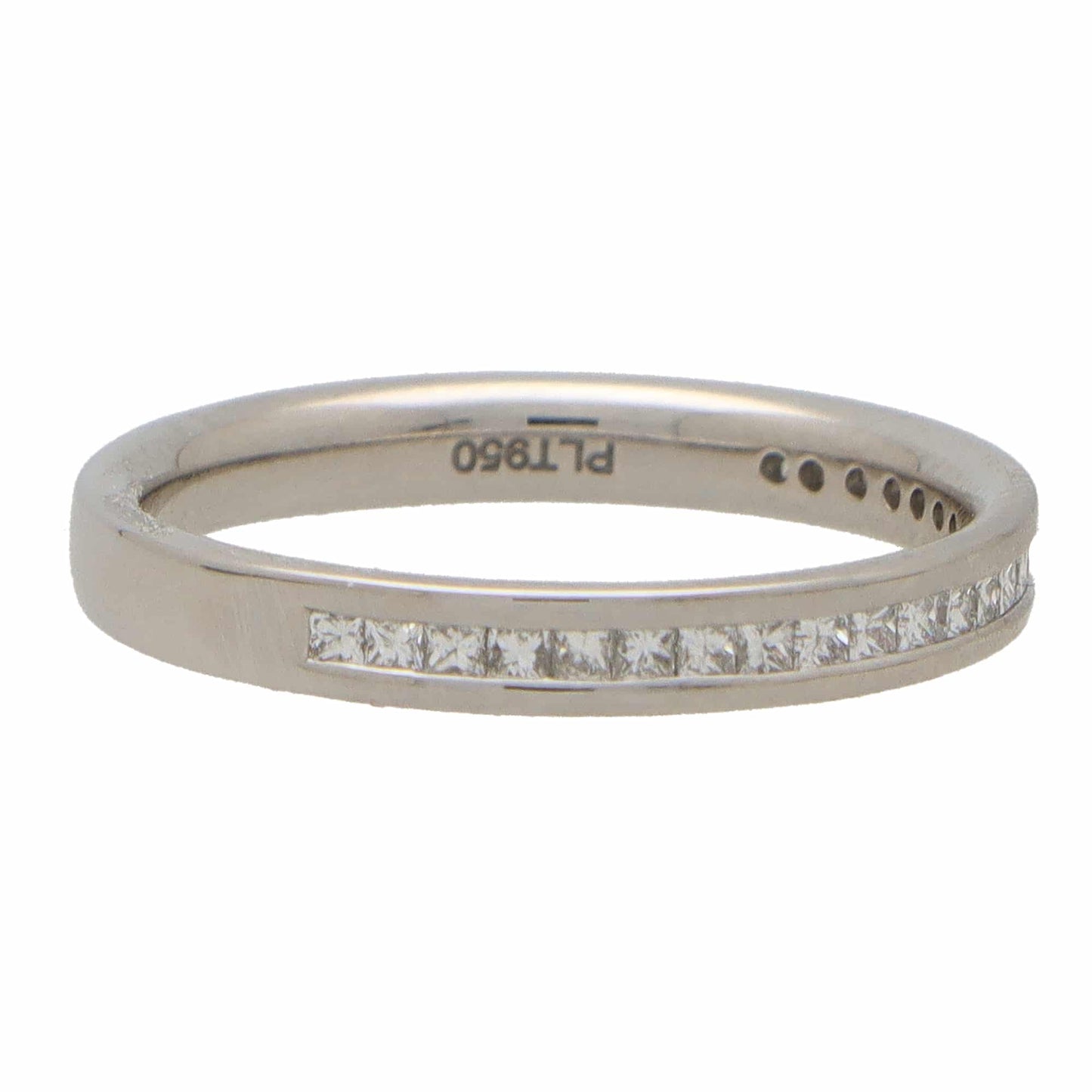 A platinum eternity ring with princess cut diamonds, stamped PLT950, on a white background