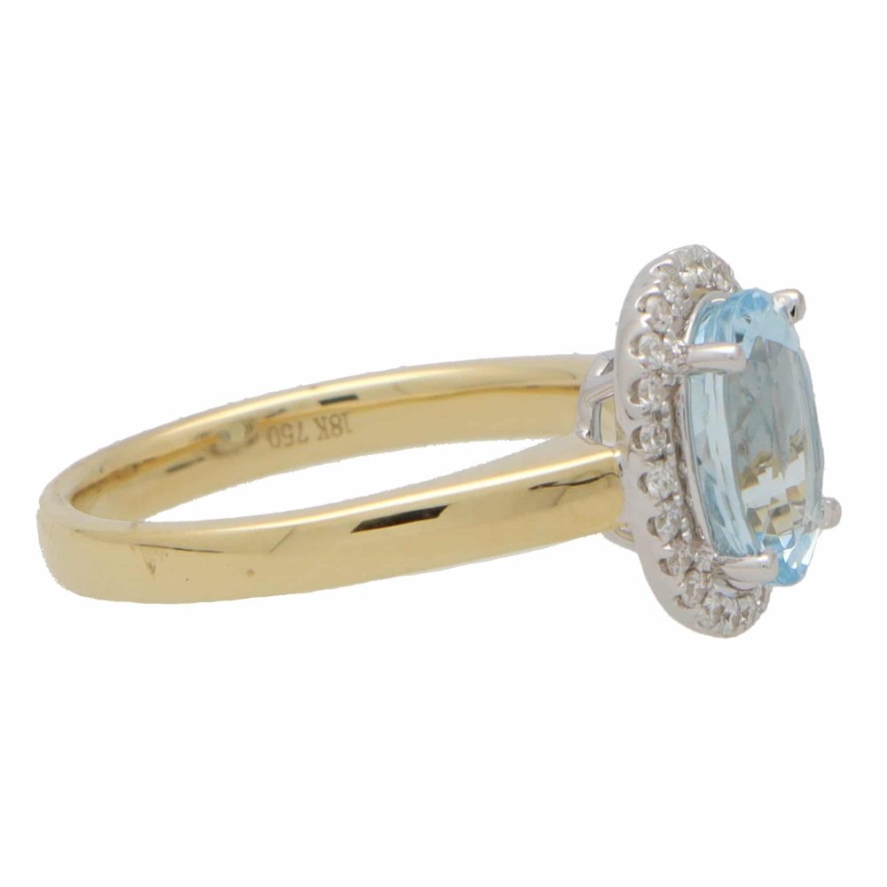 3.39ct Oval Aquamarine and Diamond Halo Cluster Engagement Ring