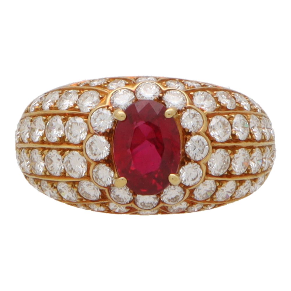 Vintage ruby and diamond cluster bombe ring in yellow gold.