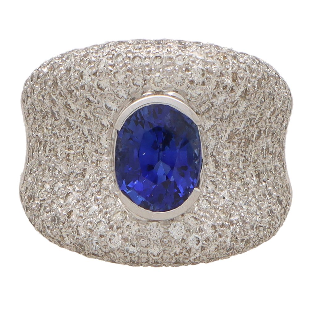 Vintage sapphire and diamond bombe ring in white gold.