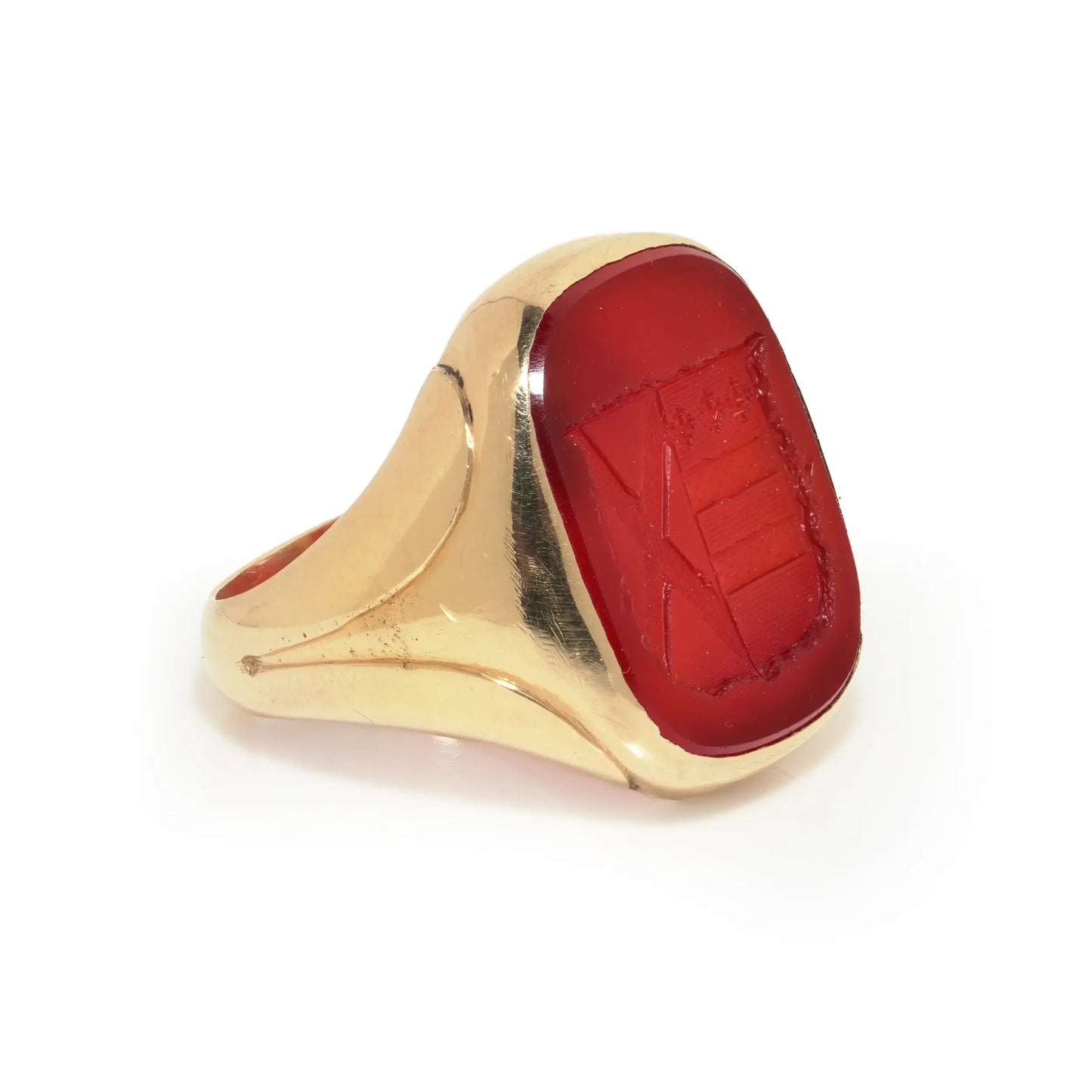 A yellow gold carnelian set signet ring with an intaglio