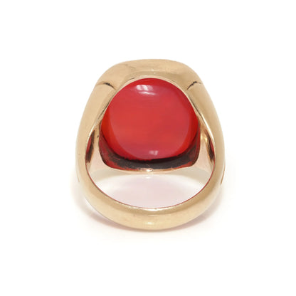 A yellow gold carnelian set signet ring with an intaglio