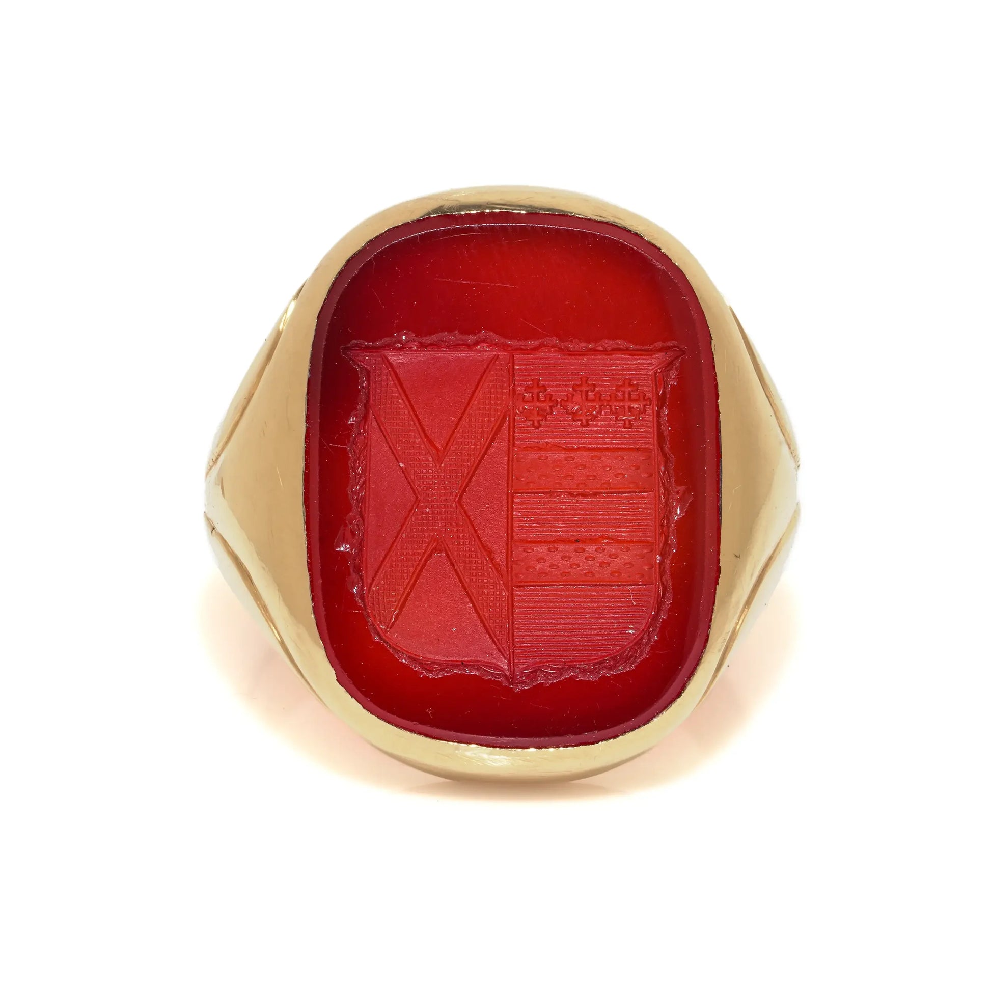 A yellow gold carnelian set signet ring with an intaglio